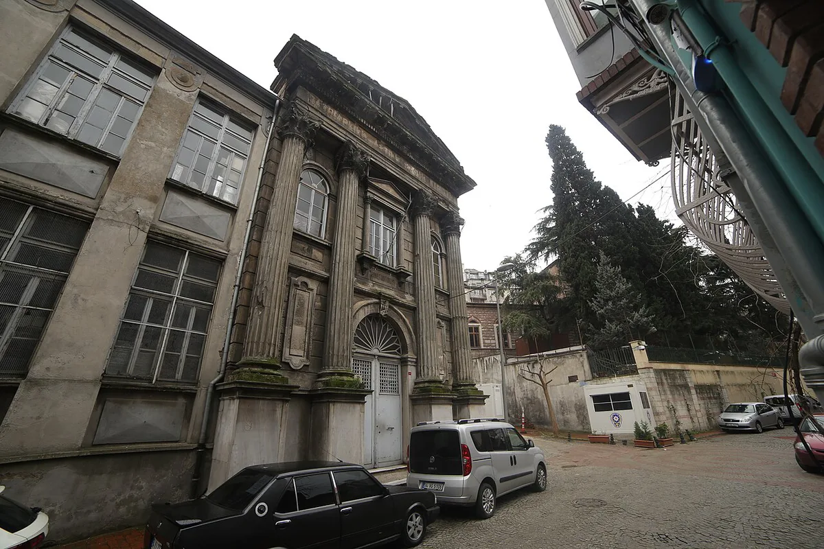 Colorful houses with bay windows lining the steep steps of Kiremit Street in Balat, Istanbul — 2