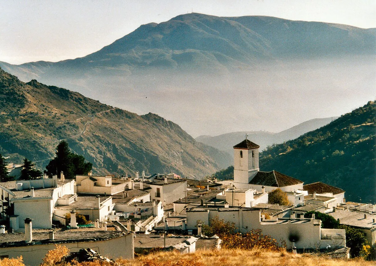 Whitewashed houses and terraced hillsides of Capileira in Las Alpujarras near Granada — 1