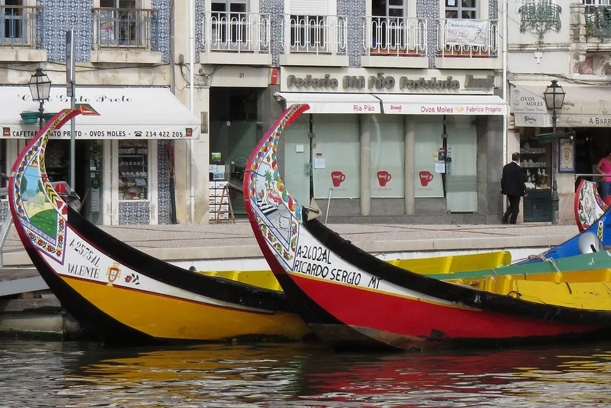 Painted moliceiro boats on the canals of Aveiro, known as the Venice of Portugal