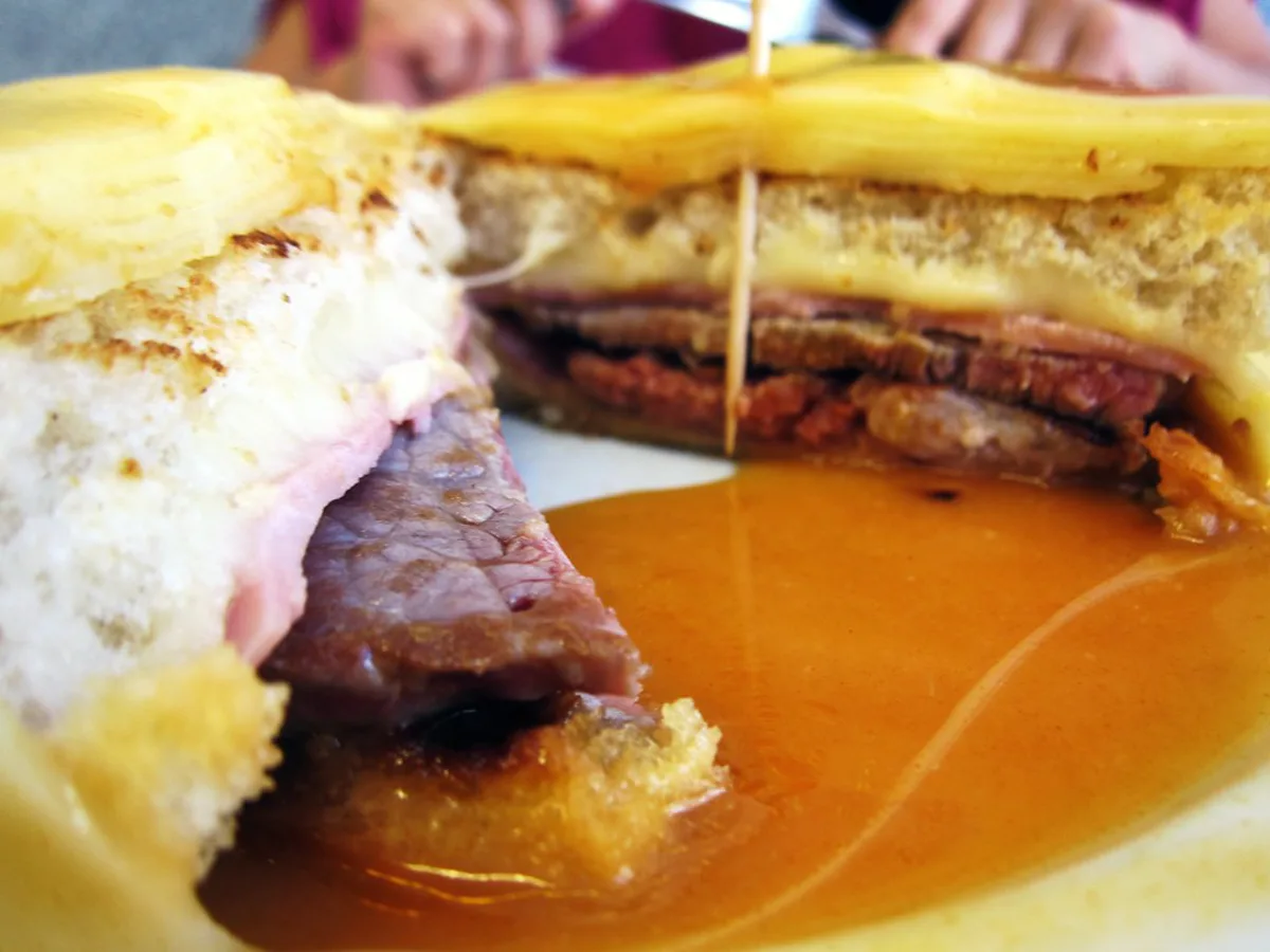 Authentic Francesinha sandwich served in Porto, Portugal with traditional sauce