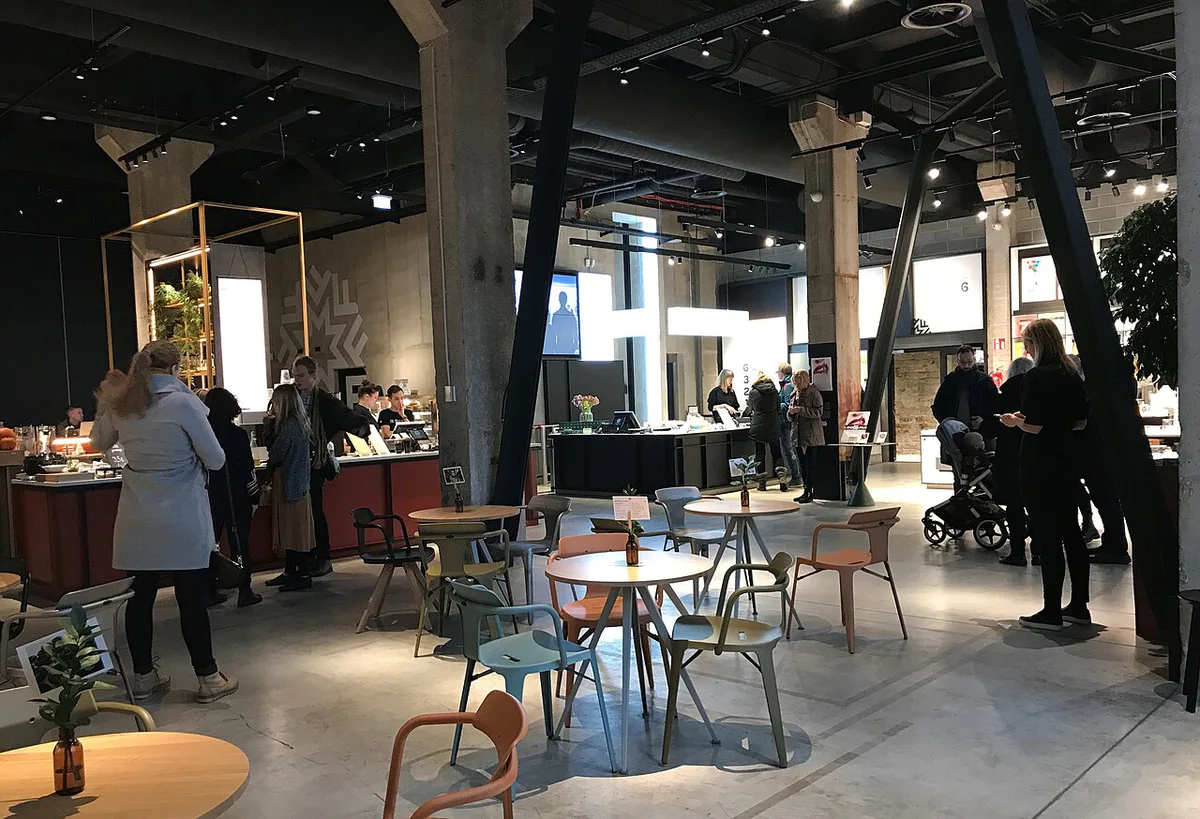 Diners at an outdoor restaurant terrace inside Telliskivi Creative City in Tallinn — 1