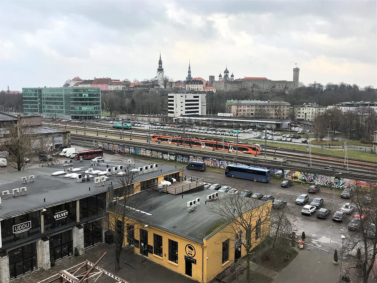 Diners at an outdoor restaurant terrace inside Telliskivi Creative City in Tallinn — 2
