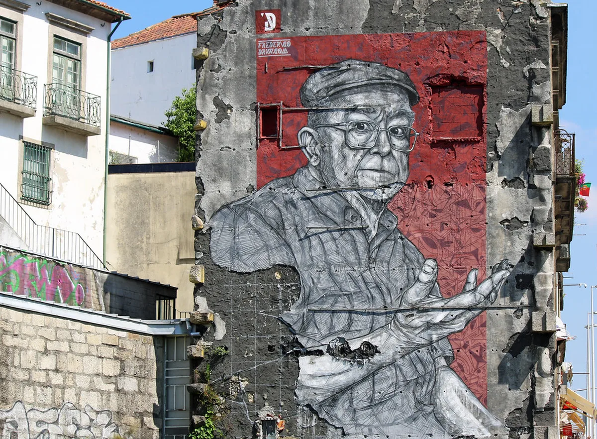 Colorful street art mural on Rua Miguel Bombarda Porto
