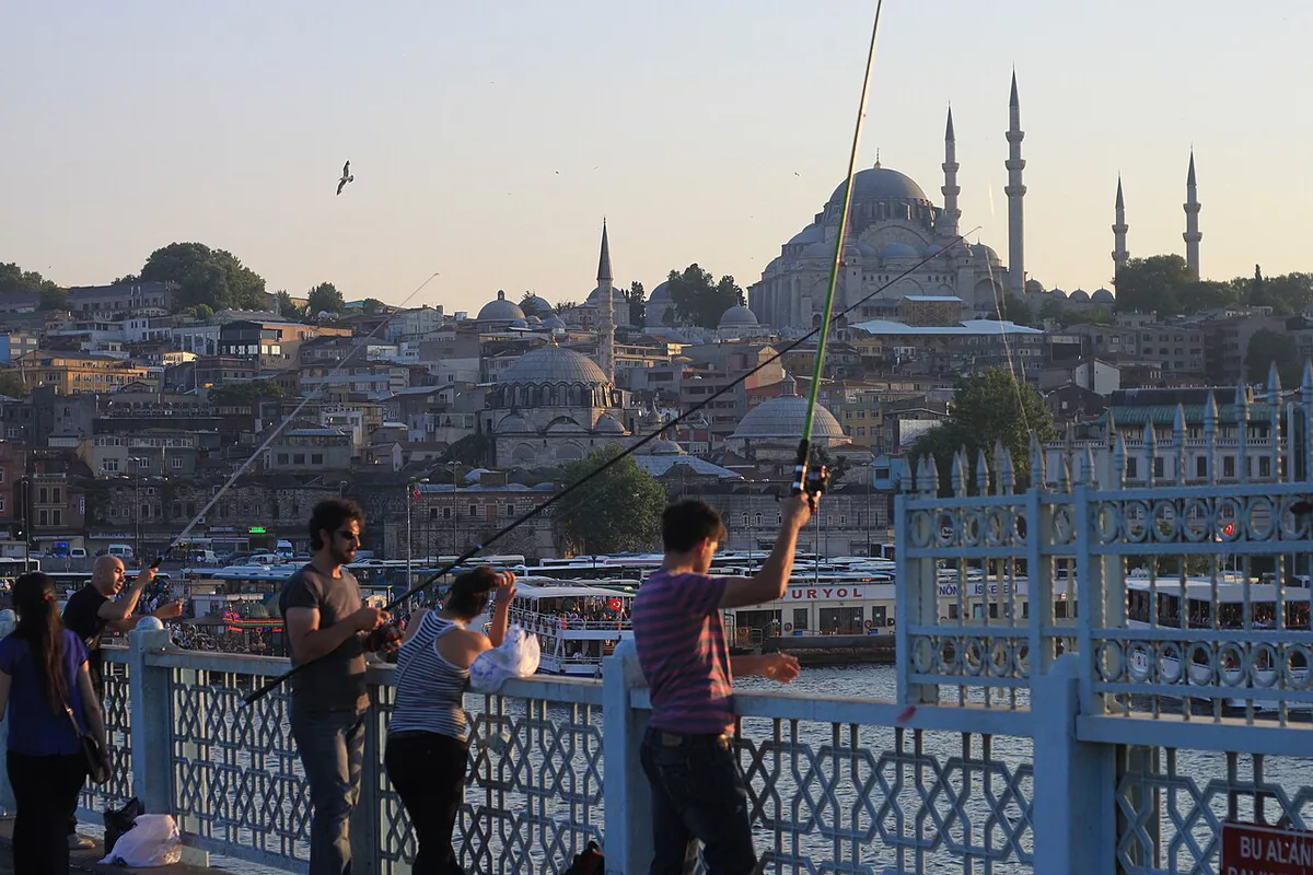 Fishermen lining the Galata Bridge over the Golden Horn in Istanbul — 2