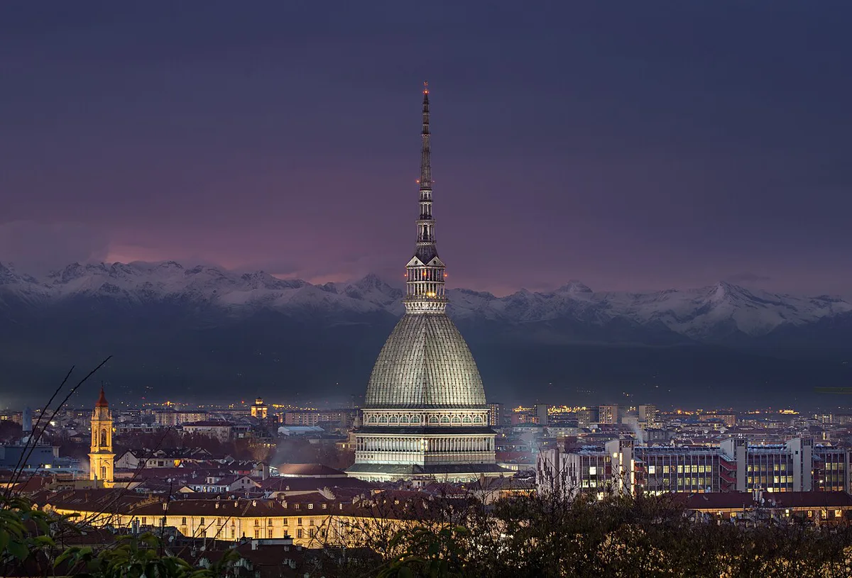 View over Turin's rooftops and the Mole Antonelliana from Monte dei Cappuccini with the Alps behind — 1