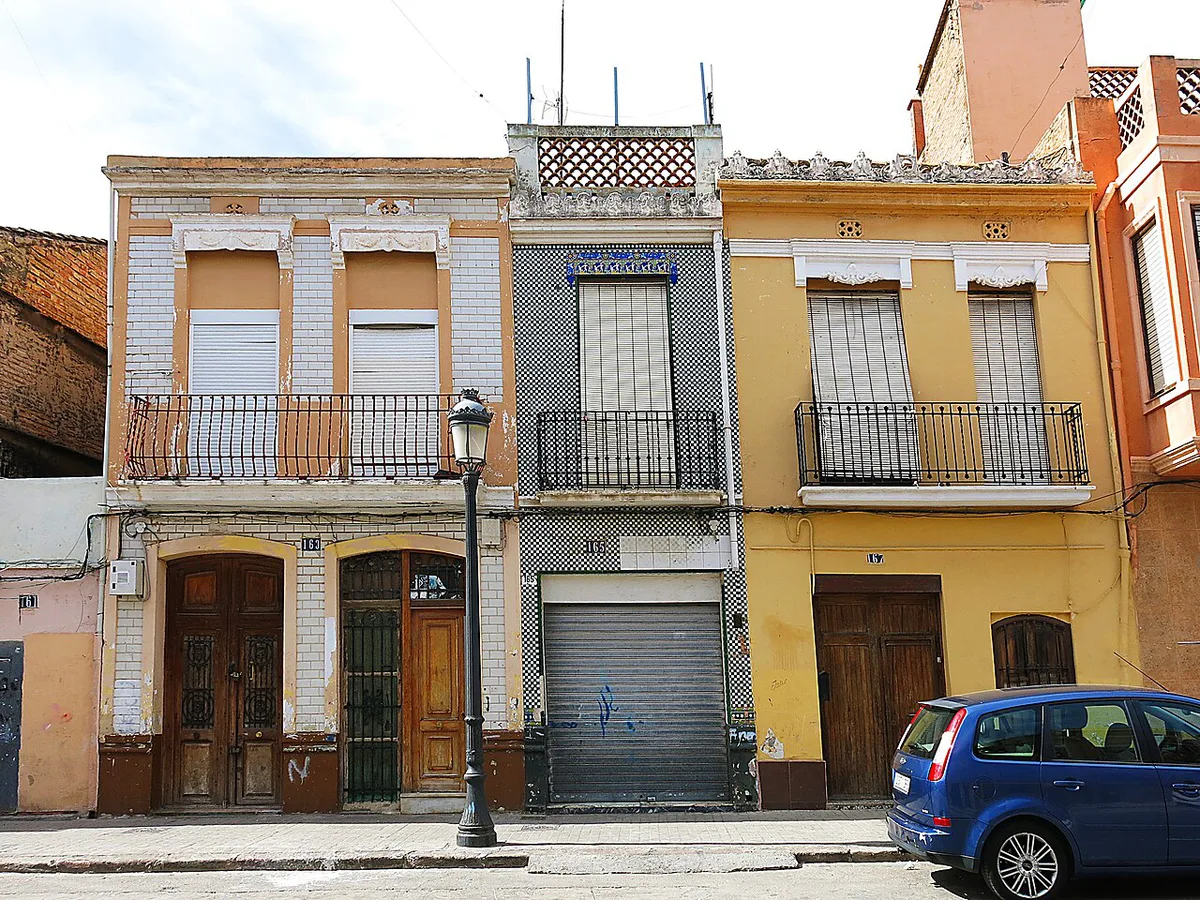 Colourful ceramic-tiled houses along a quiet street in Valencia's El Cabanyal fishing quarter — 2