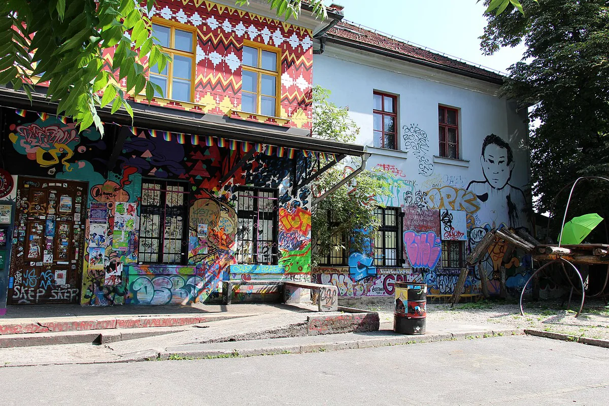 Colourful murals and sculptures covering the former army barracks at Metelkova mesto in Ljubljana — 1
