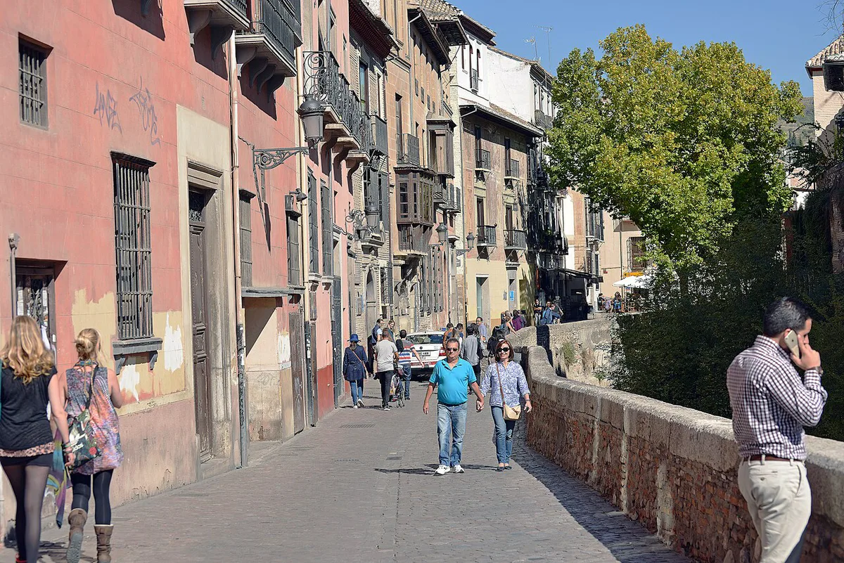 Carrera del Darro riverside street below the Alhambra walls in Granada — 1