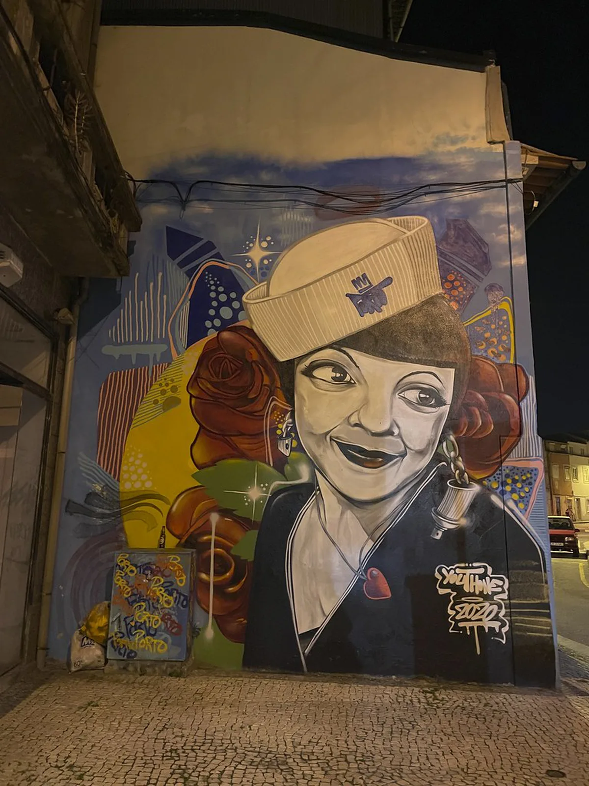 Colorful street art on building in Cedofeita Porto art district
