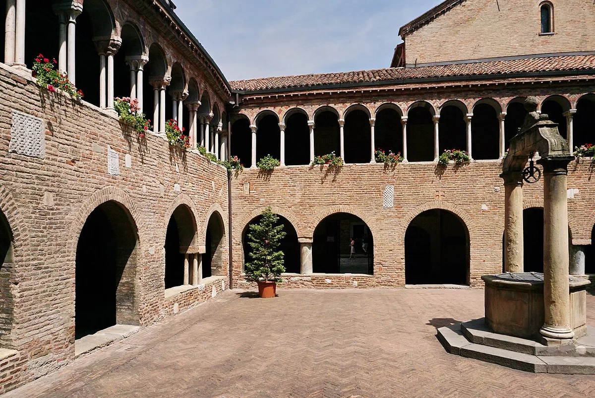 Small wooden shutter window revealing the hidden Canale delle Moline in Bologna — 1
