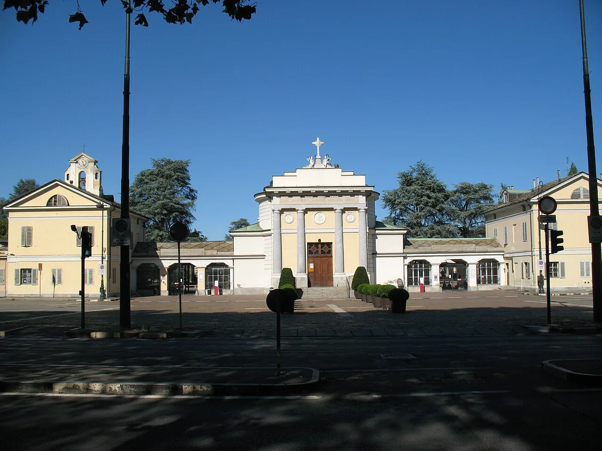 Ornate 19th-century sculpted tombs among trees at the Cimitero Monumentale di Torino — 2