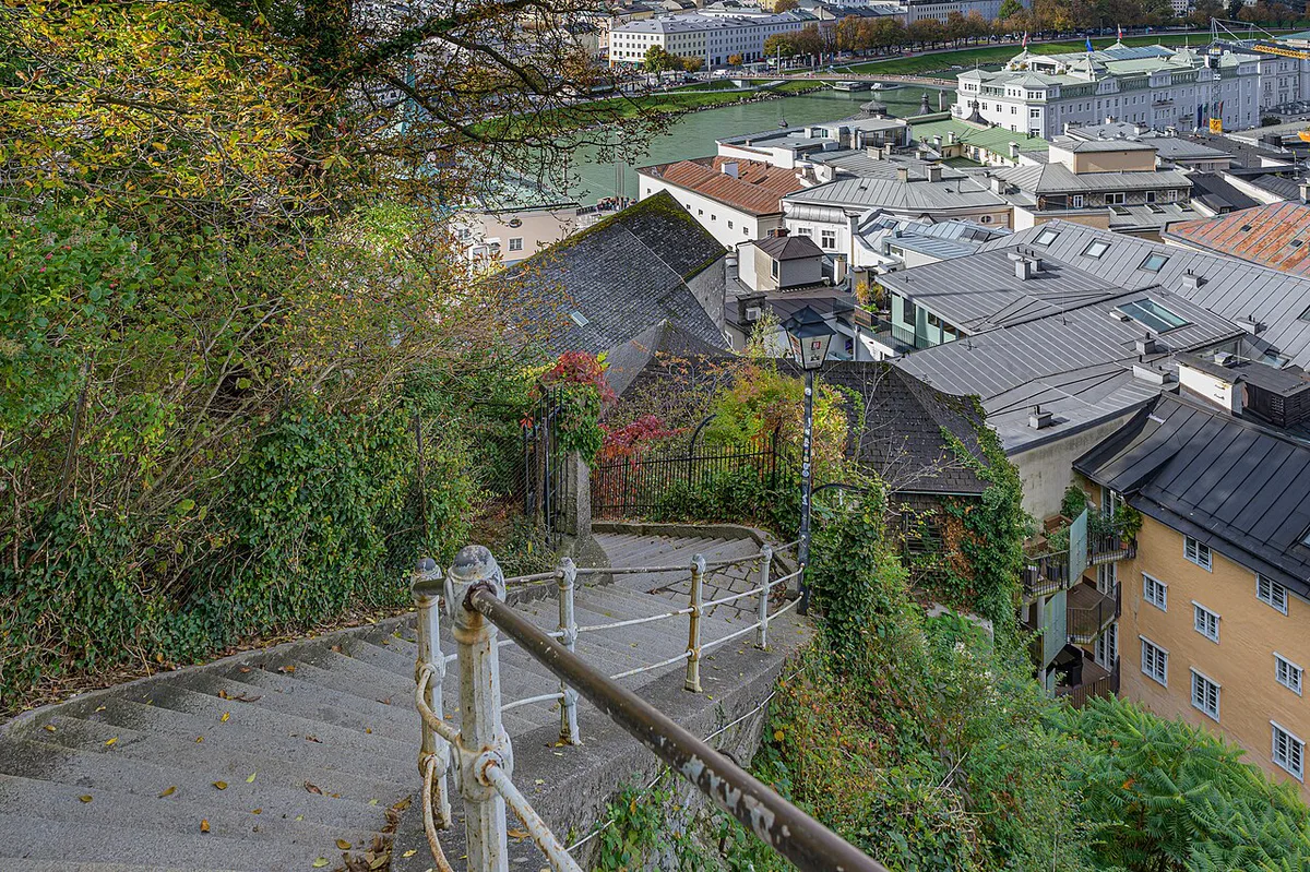 The narrow cobbled medieval Steingasse lane with pastel facades in Salzburg — 2
