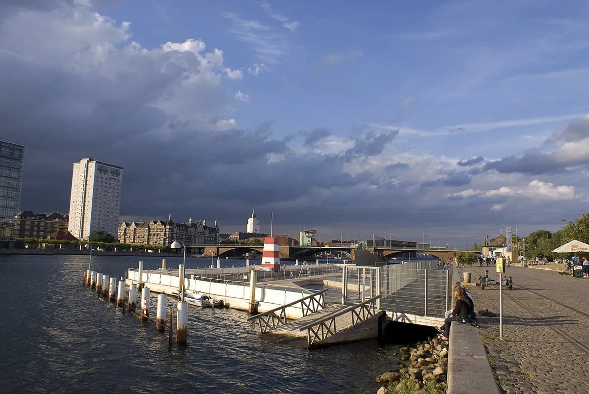 Skiers on the artificial rooftop ski slope of CopenHill above Copenhagen's harbor — 2