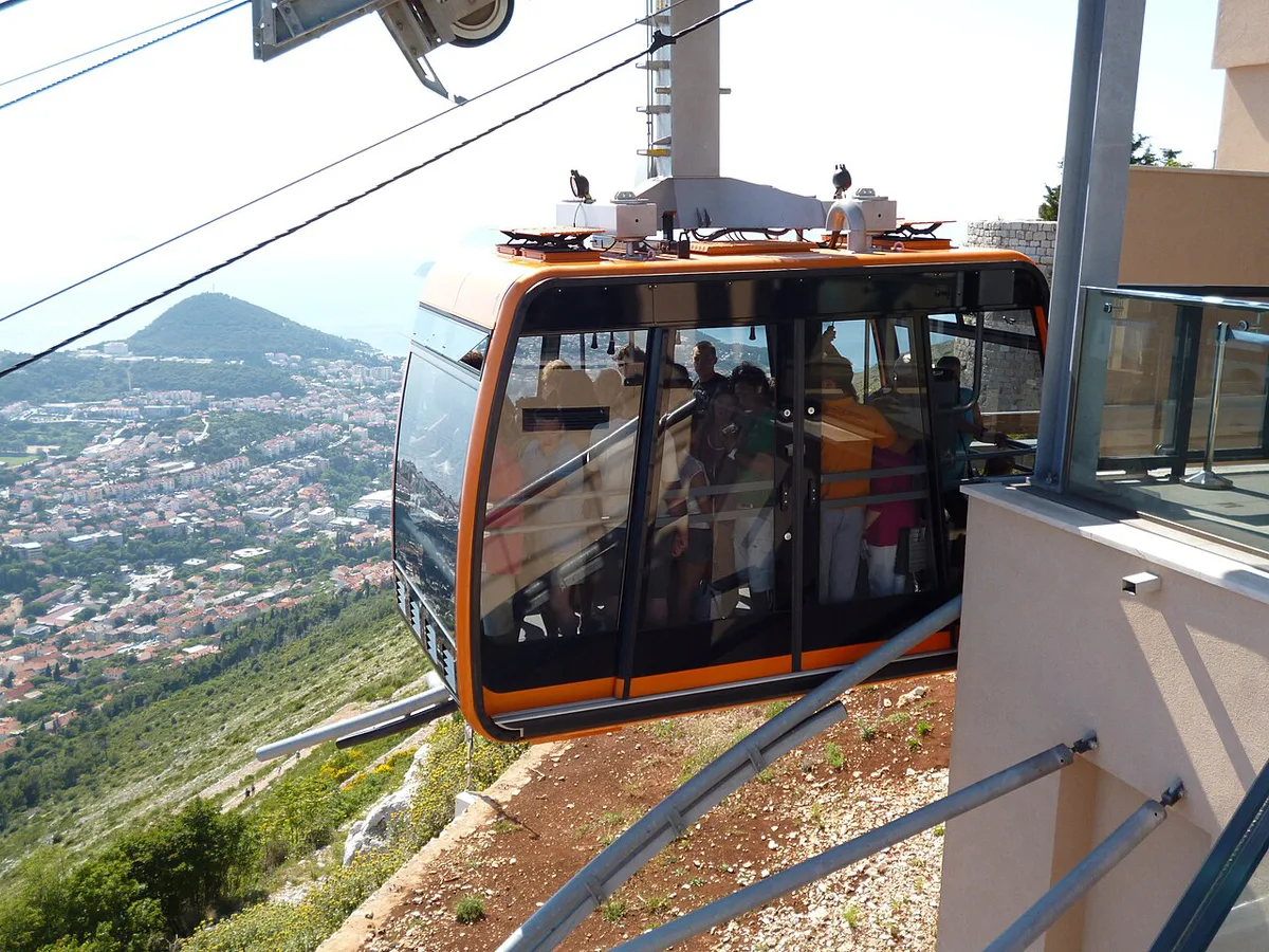 Cable car ascending Mount Srđ above the walled city of Dubrovnik — 2