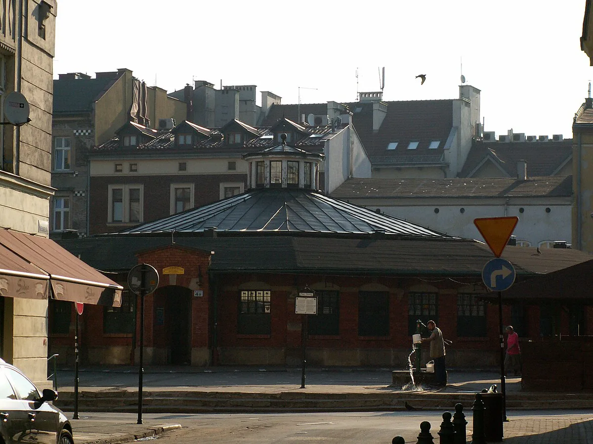 St. Mary's Basilica towers on Rynek Główny where the hejnał bugle call is played hourly in Kraków — 2