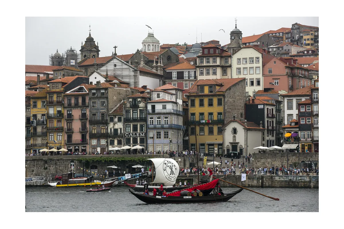 Traditional Porto Douro rabelo boat on river at golden hour
