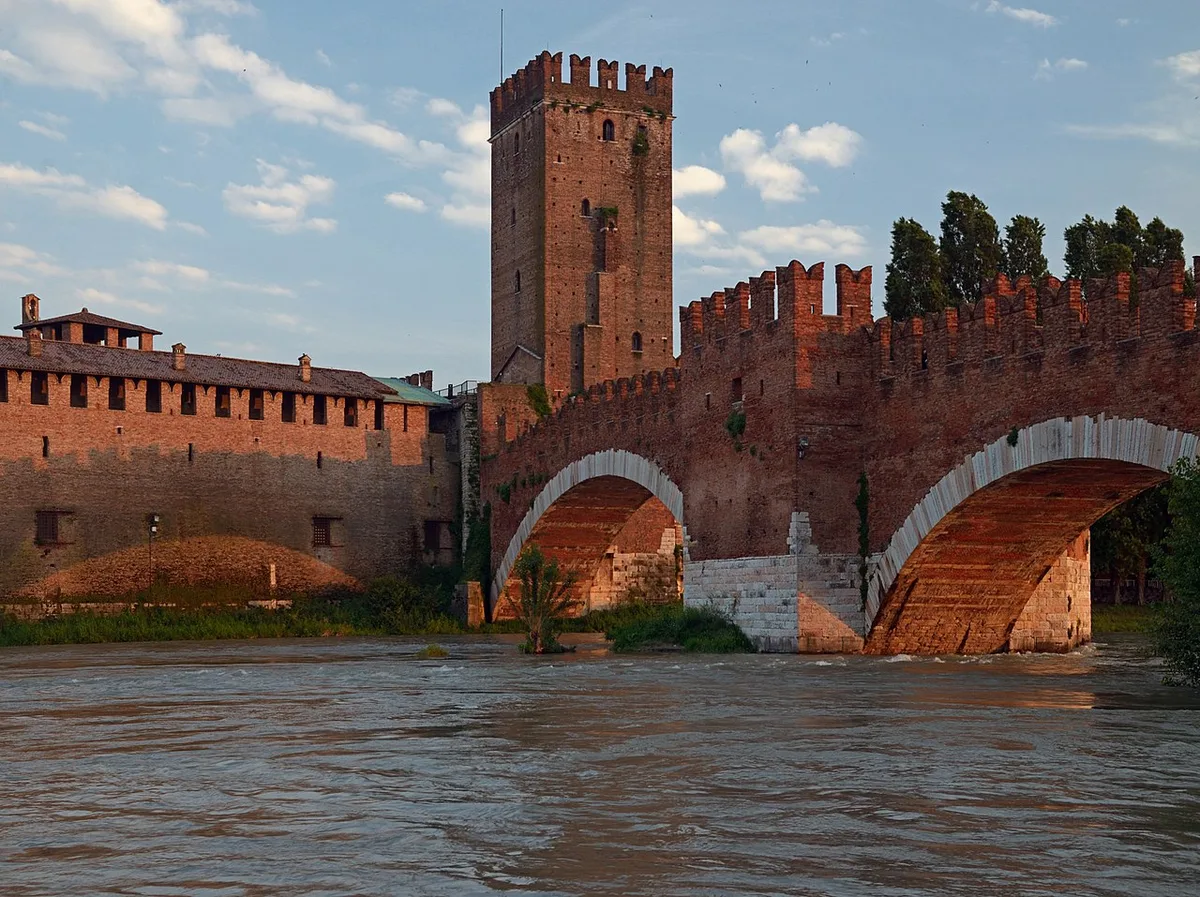 The red funicular car climbing the hillside to Castel San Pietro above Verona — 1