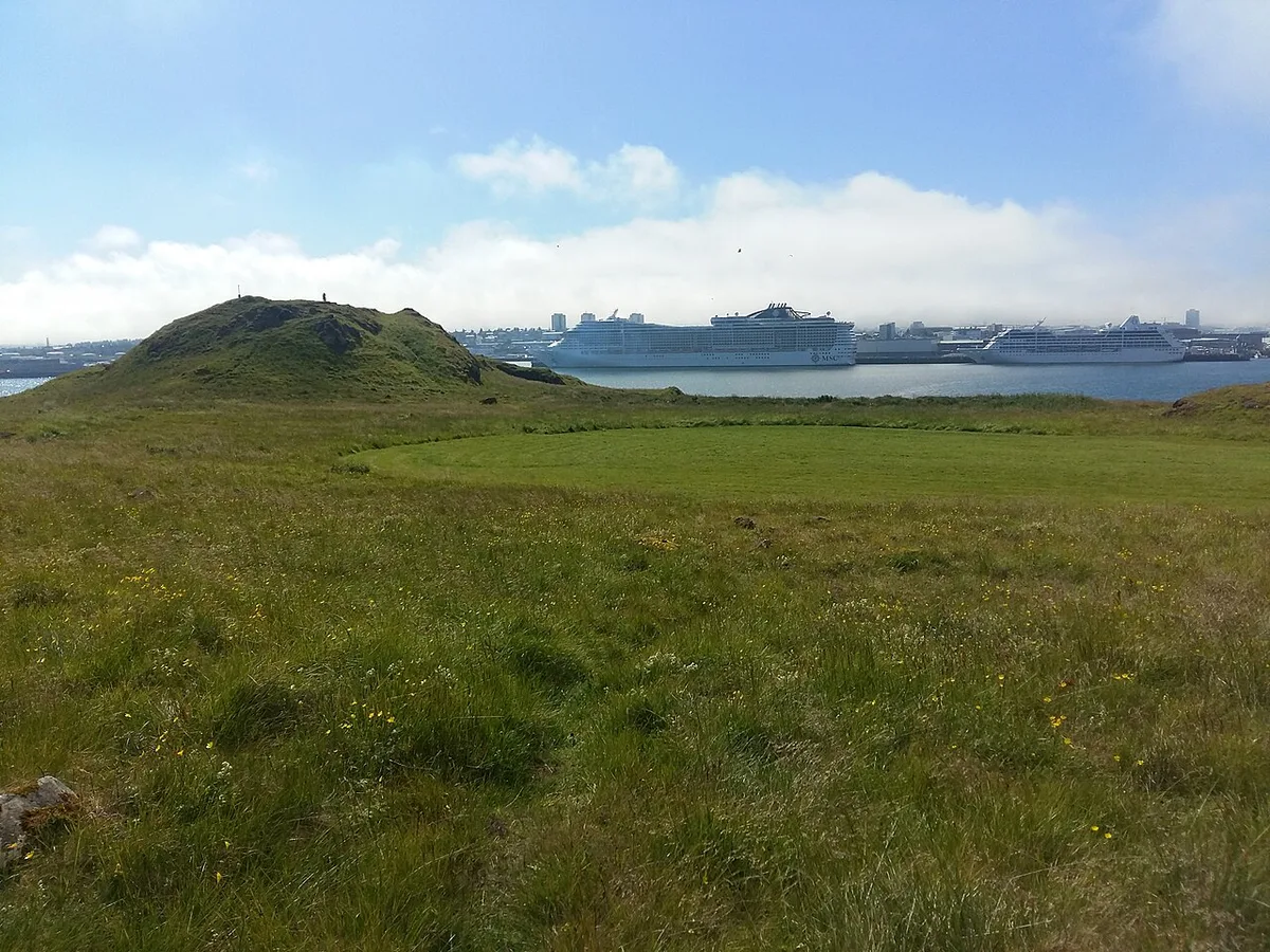 The vertical light beam of the Imagine Peace Tower rising from Viðey island near Reykjavik — 2