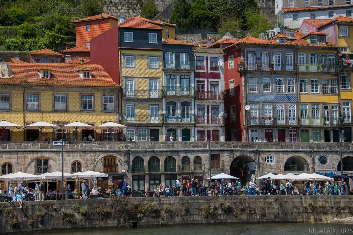 Scenic Douro River waterfront with historic buildings reflecting Porto's riverside architecture
